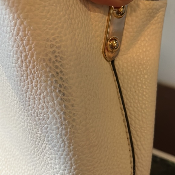 Valentina white purse. Used once + stored. Clean. See smudge of denim dye. Cute - Picture 6 of 6